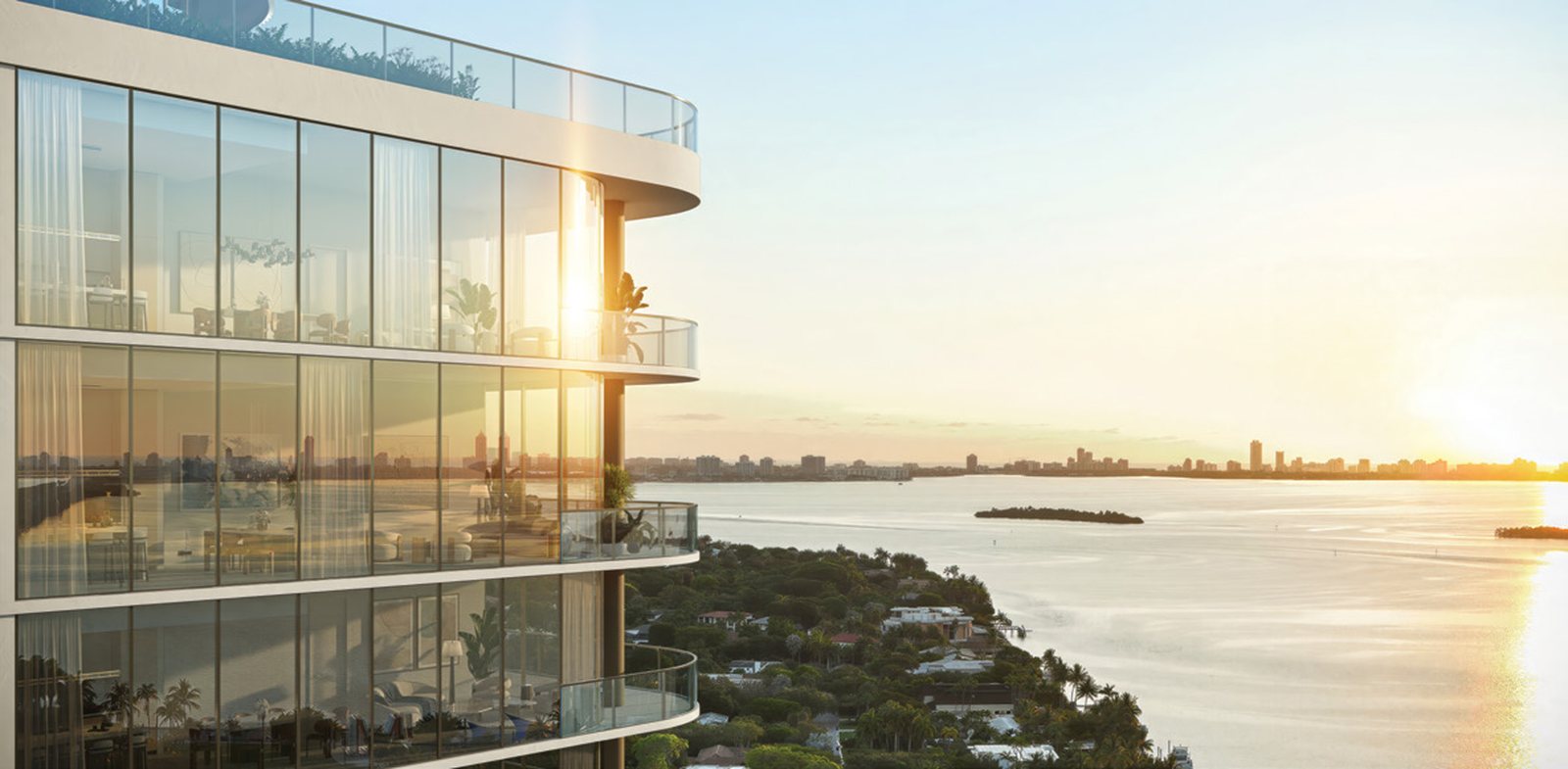 Rendering of the curved glass facades of the two towers at dusk