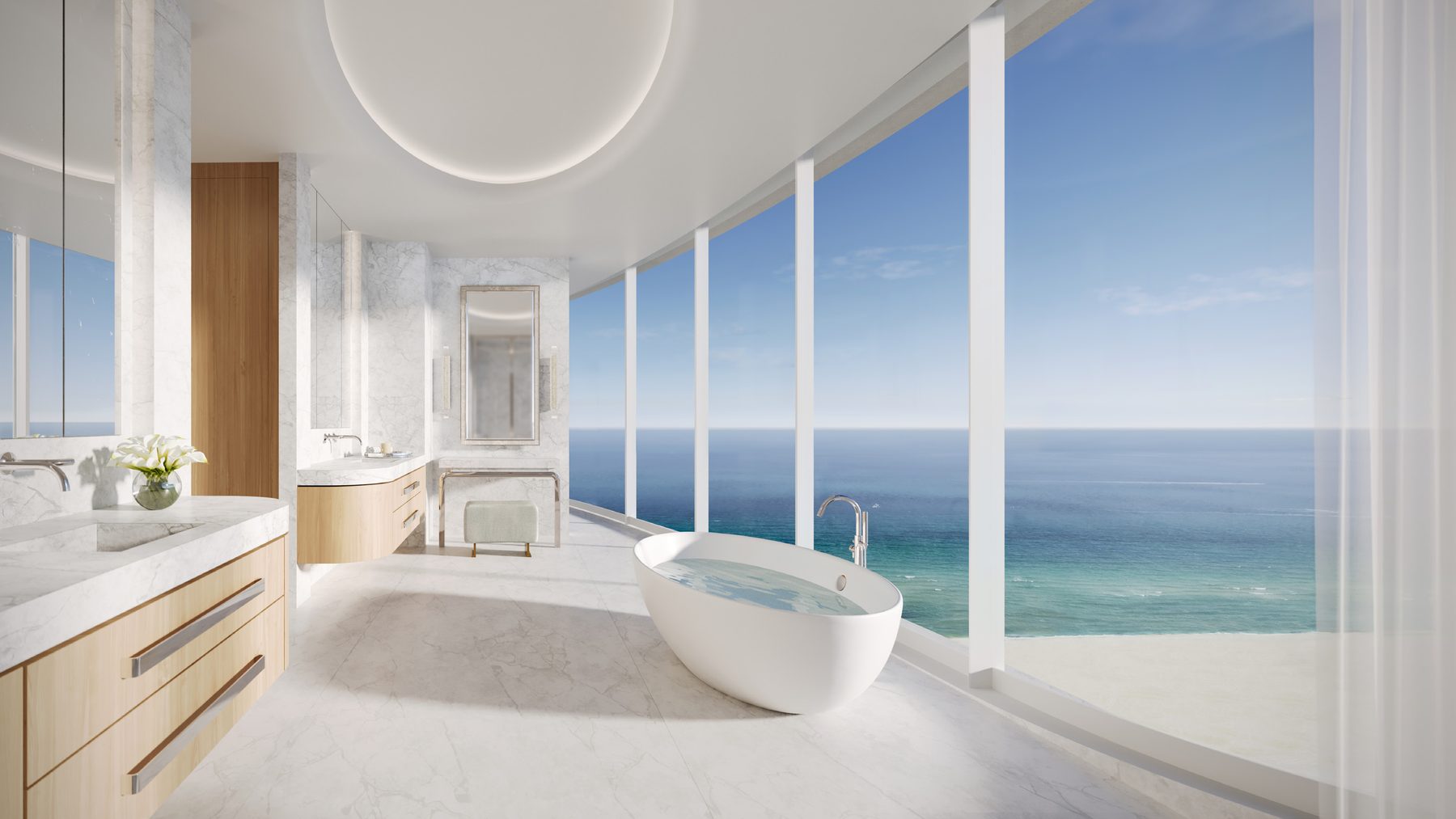 Rendering of a primary bath with a freestanding tub facing the ocean
