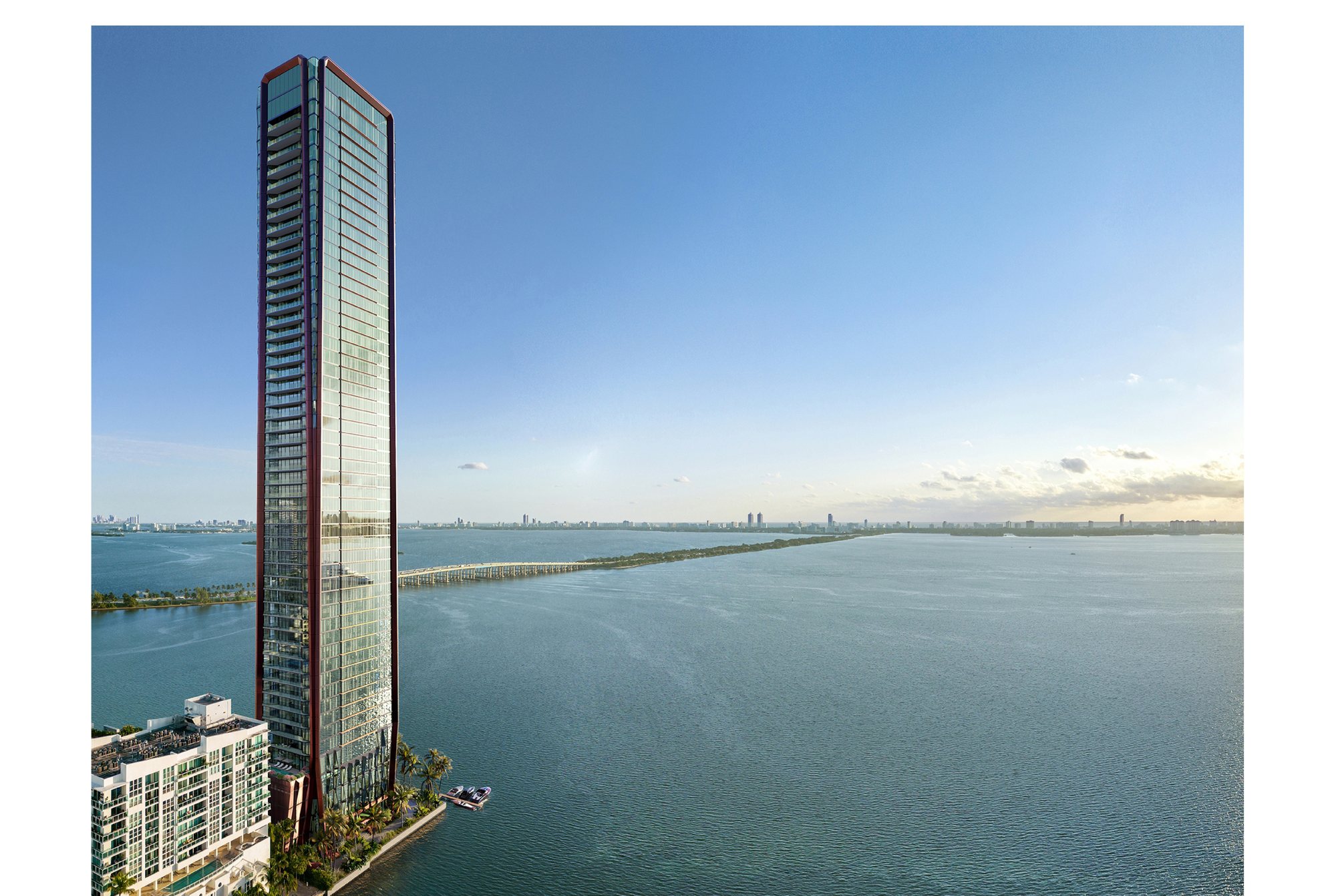 Rendering of the Villa Miami tower rising from the Edgewater bayfront with Biscayne Bay and the causeway beyond